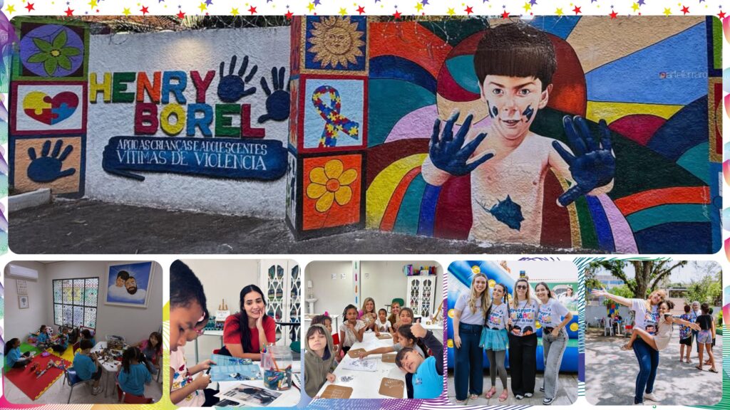Pintura mural do Instituto Henry Borel com mensagem "Combate à Violência Infantil" e crianças com mãos pintadas.